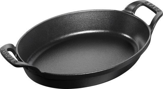 Rostiera ovale in ghisa per induzione colore nero con maniglie di Staub, diam.21cm