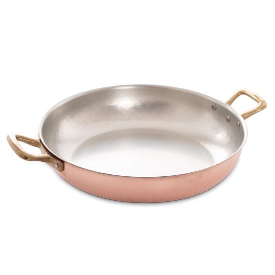 Tin-plated hammered copper pan with two brass handles, diam. 28cm